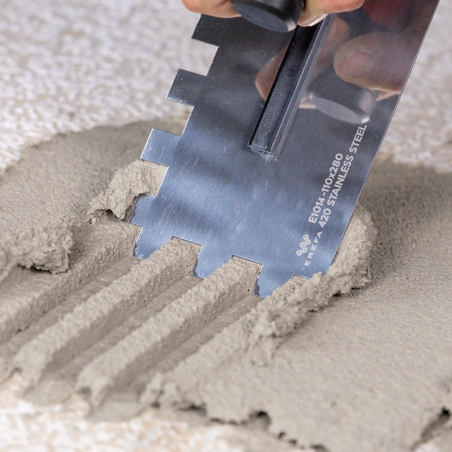 E1013 Stainless steel notched trowel for adhesive – 12mm teeth