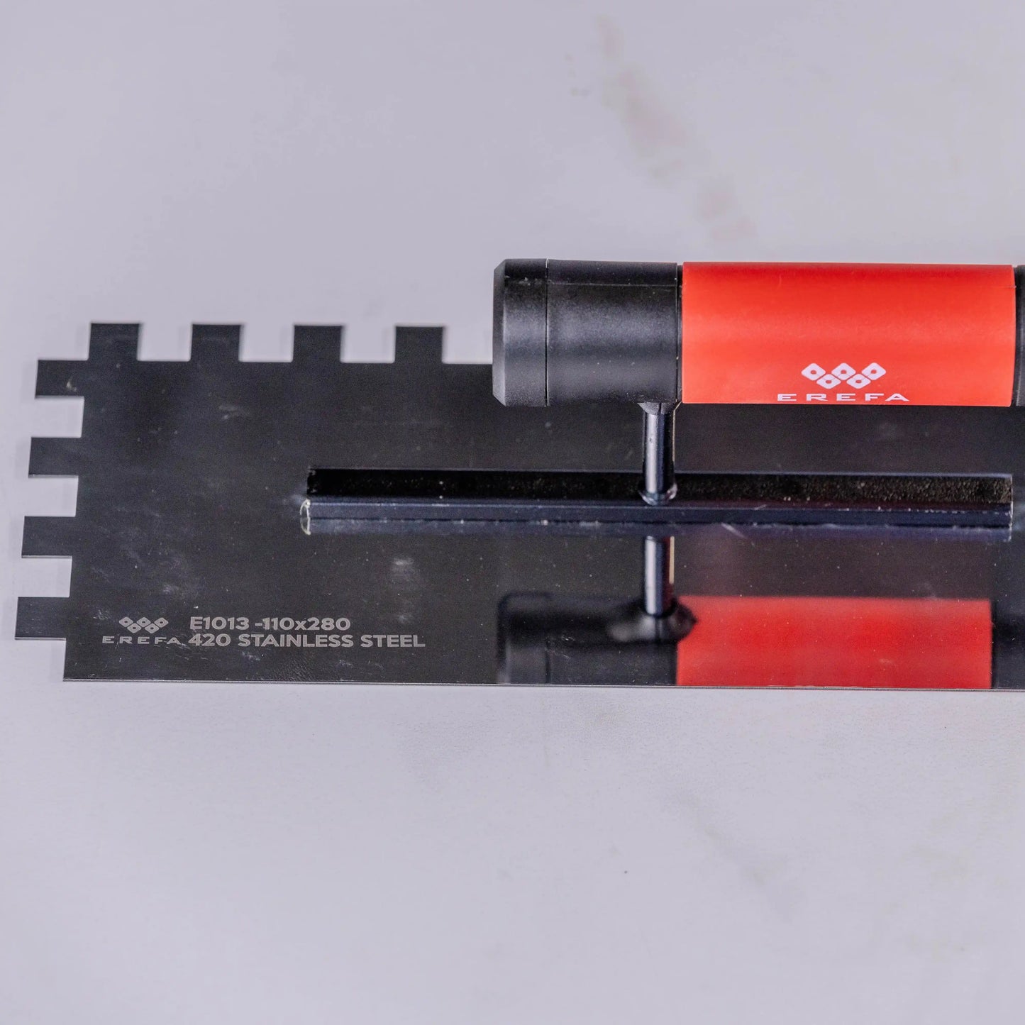 E1013 Stainless steel notched trowel for adhesive – 12mm teeth
